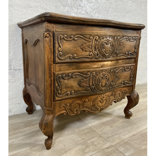 7 - A French Louis XV style carved walnut chest of drawers on cabriole supports - approx. 67cm high x 71... 