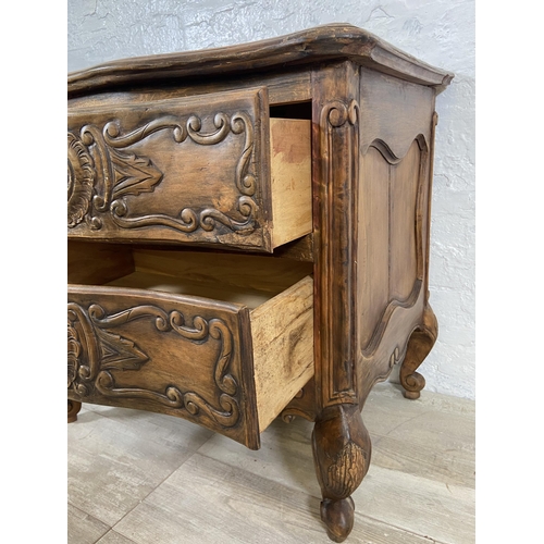 7 - A French Louis XV style carved walnut chest of drawers on cabriole supports - approx. 67cm high x 71... 