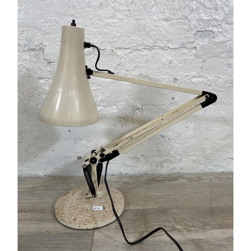 81 - An Anglepoise white metal articulated desk lamp - approx. 75cm high