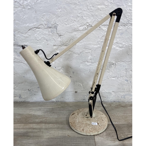 81 - An Anglepoise white metal articulated desk lamp - approx. 75cm high