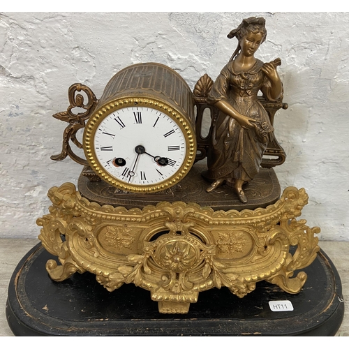 90 - A 19th century French gilt metal figural chiming mantel clock with pendulum, key and glass dome - ap... 