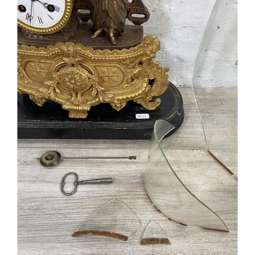 90 - A 19th century French gilt metal figural chiming mantel clock with pendulum, key and glass dome - ap... 