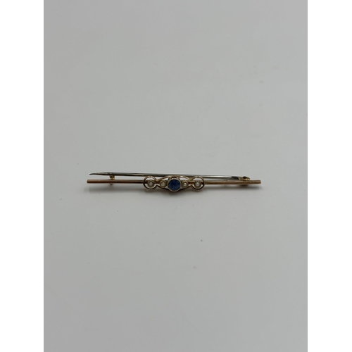 2127 - A late 19th/early 20th century 9ct gold sapphire and seed pearl set brooch with base metal pin - app... 