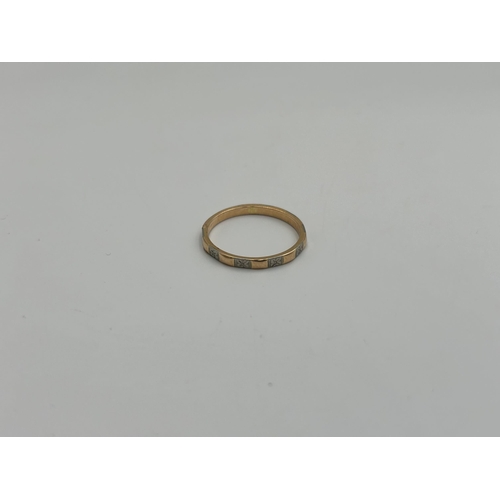 2135 - A hallmarked Birmingham 18ct gold and platinum eternity ring, size O - approx. gross weight 2g