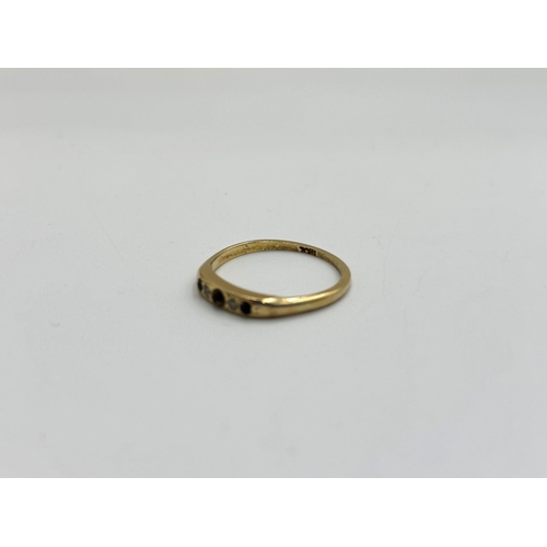 2138 - An 18ct gold sapphire and diamond ring, size N - approx. gross weight 2.1g