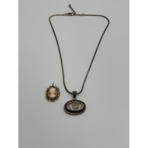 2146 - Two pieces of jewellery, one hallmarked 9ct gold cameo pendant - approx. gross weight 2.1g and one .... 