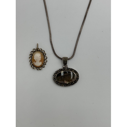 2146 - Two pieces of jewellery, one hallmarked 9ct gold cameo pendant - approx. gross weight 2.1g and one .... 