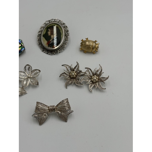 2150 - Six silver brooches to include .925, .800 etc