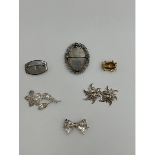 2150 - Six silver brooches to include .925, .800 etc