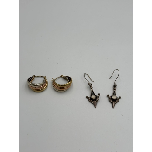 2153 - Two pairs of earrings, one 9ct tri-colour gold and one .925 silver moonstone set - approx. gross gol... 