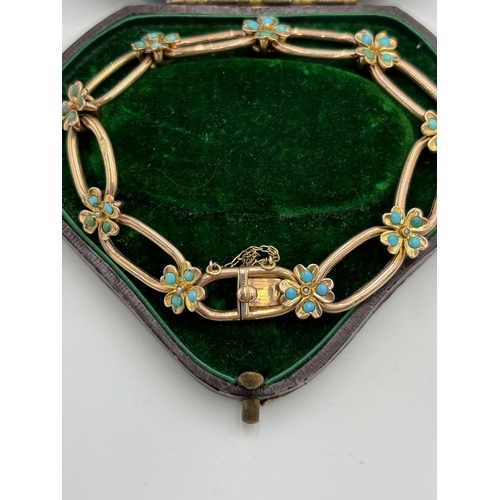 2154 - An Edwardian hallmarked 9ct gold turquoise and seed pearl set floral bracelet - approx. gross weight... 