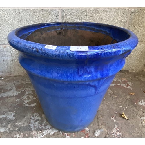 101 - Three glazed terracotta planters - largest approx. 41cm high x 48cm wide x 34cm deep