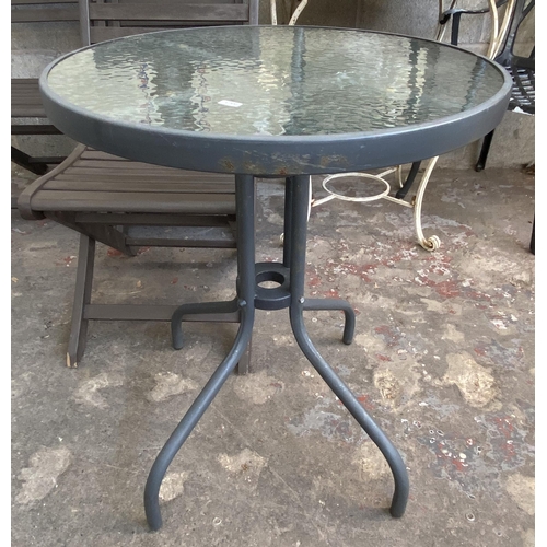 102 - Ten pieces of garden furniture to include grey metal and glass circular bistro table, grey metal and... 