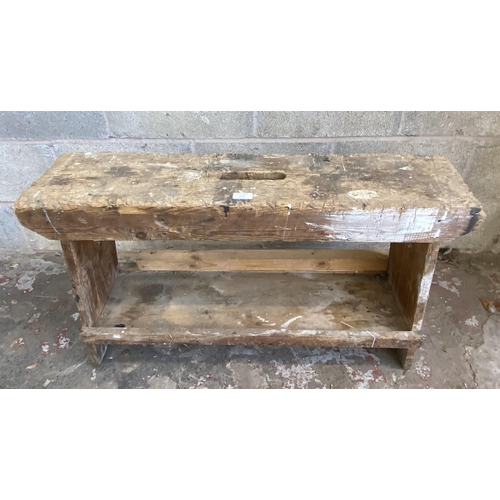 112 - An early 20th century pine work bench - approx. 57cm high x 22cm wide x 90cm long