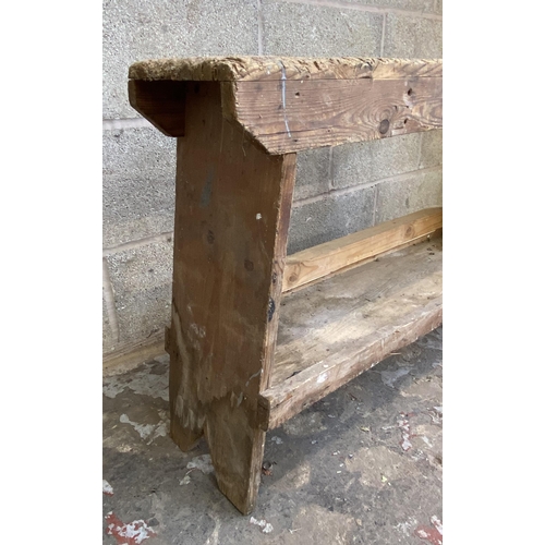 112 - An early 20th century pine work bench - approx. 57cm high x 22cm wide x 90cm long