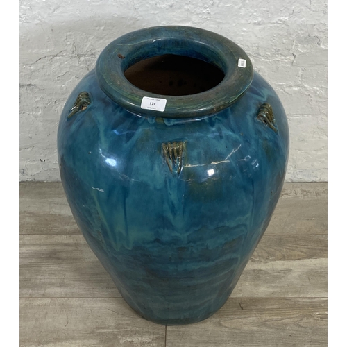 114 - A large blue drip glazed terracotta garden planter - approx. 67cm high