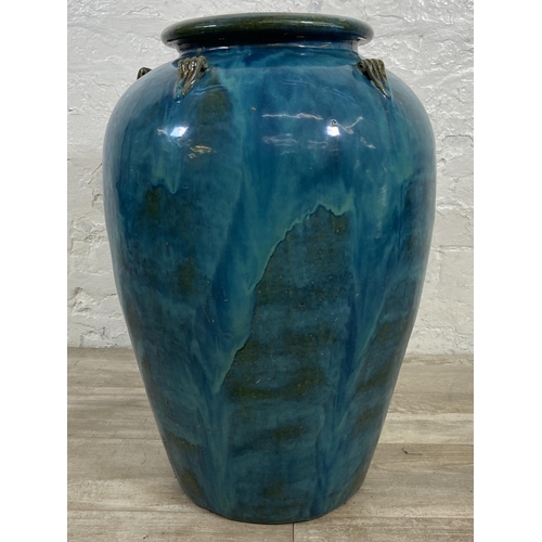 114 - A large blue drip glazed terracotta garden planter - approx. 67cm high