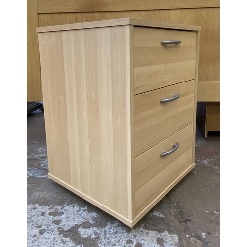 119 - Three pieces of furniture, one beech two drawer filing cabinet, one beech effect bedside chest of th... 