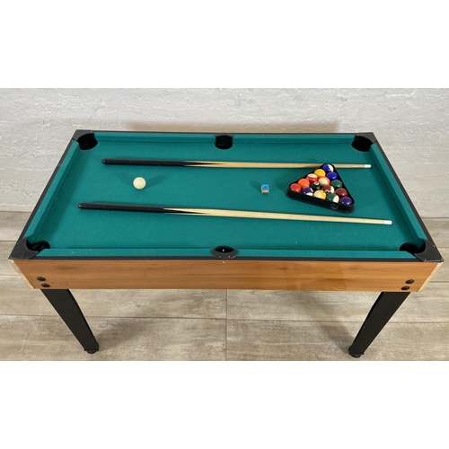 124 - A multi-games table to include table football, pool, table tennis, skittles, air hockey etc.