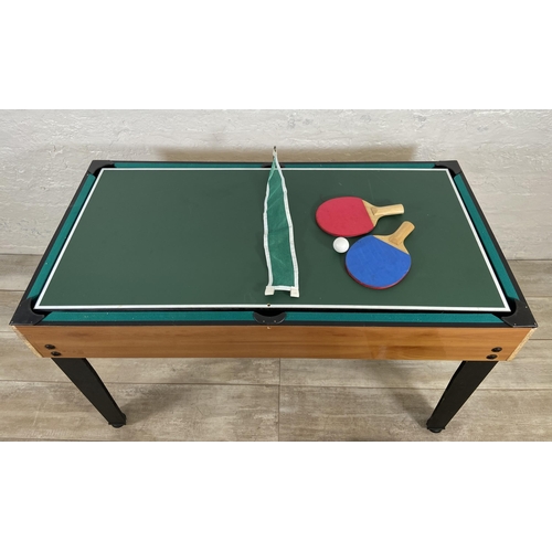 124 - A multi-games table to include table football, pool, table tennis, skittles, air hockey etc.