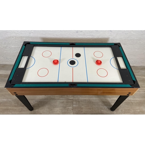 124 - A multi-games table to include table football, pool, table tennis, skittles, air hockey etc.