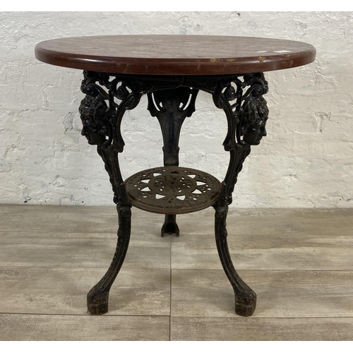 129 - A Victorian Gaskell & Chambers Ltd. of Birmingham cast iron pub table with later added circular oak ... 