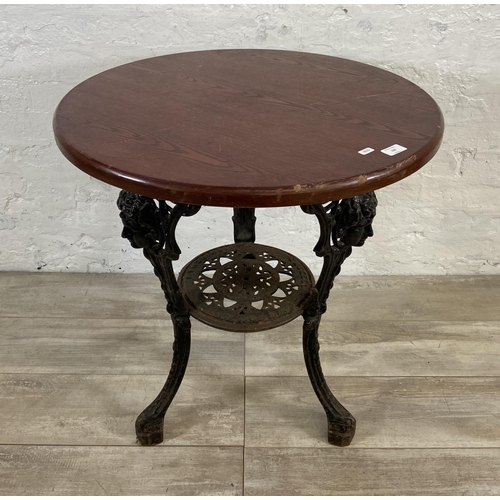 129 - A Victorian Gaskell & Chambers Ltd. of Birmingham cast iron pub table with later added circular oak ... 