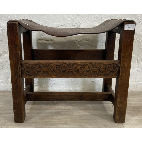 130 - An Antique Reproductions of Worcester carved oak and brown leather stool - approx. 45cm high x 50cm ... 