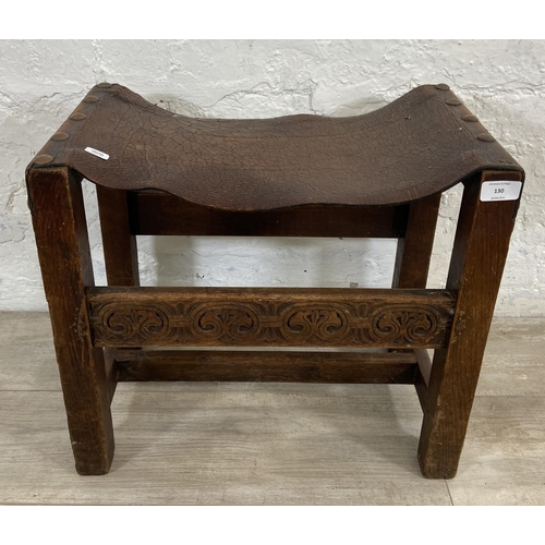 130 - An Antique Reproductions of Worcester carved oak and brown leather stool - approx. 45cm high x 50cm ... 