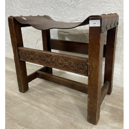 130 - An Antique Reproductions of Worcester carved oak and brown leather stool - approx. 45cm high x 50cm ... 