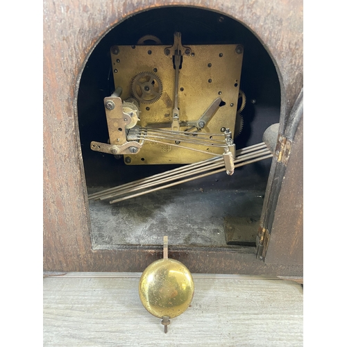 134 - An early 20th century Westminster Chime oak cased mantel clock - approx. 28cm high x 35cm wide x 17c... 