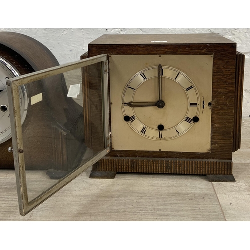 135 - Two early/mid 20th century oak cased Westminster Chime mantel clocks