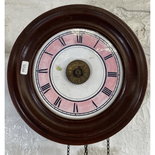 136 - Two wall clocks, one mid/late 20th century carved hardwood cuckoo and one late 19th century with pin... 