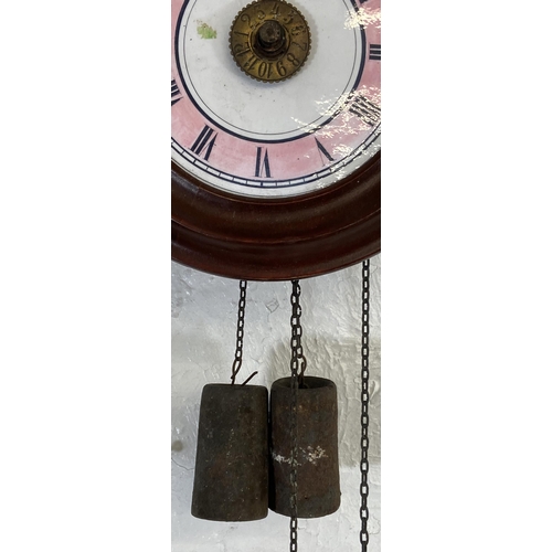 136 - Two wall clocks, one mid/late 20th century carved hardwood cuckoo and one late 19th century with pin... 