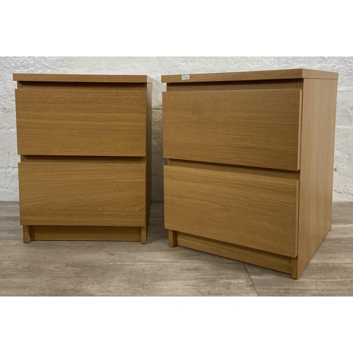 137 - A pair of IKEA Malm oak effect bedside chests of drawers - approx. 55cm high x 40.5cm wide x 48cm de... 