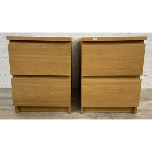 137 - A pair of IKEA Malm oak effect bedside chests of drawers - approx. 55cm high x 40.5cm wide x 48cm de... 