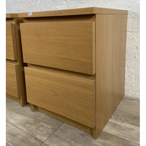 137 - A pair of IKEA Malm oak effect bedside chests of drawers - approx. 55cm high x 40.5cm wide x 48cm de... 