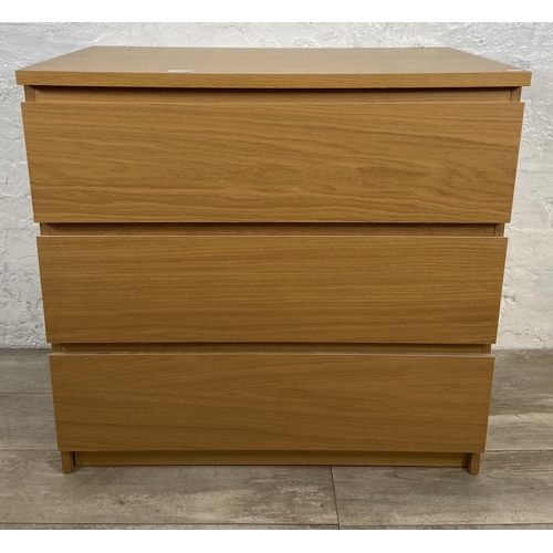 140 - An IKEA Malm oak effect chest of drawers - approx. 78cm high x 80.5cm wide x 48cm deep