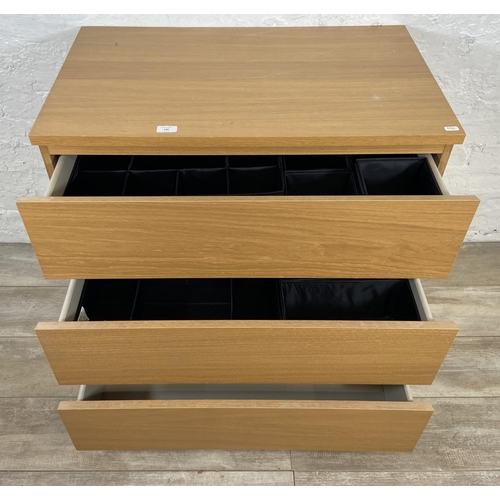 140 - An IKEA Malm oak effect chest of drawers - approx. 78cm high x 80.5cm wide x 48cm deep