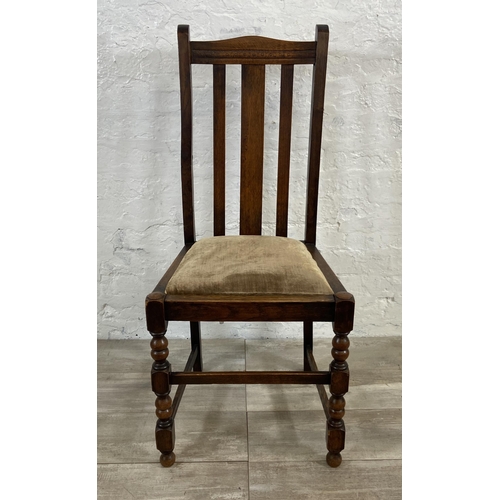 154A - A set of four 1940s oak dining chairs