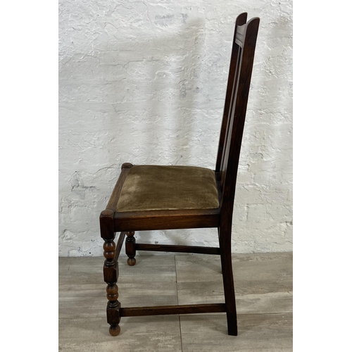 154A - A set of four 1940s oak dining chairs