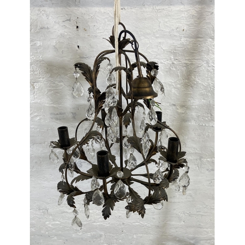 158A - A French style cast metal five branch chandelier