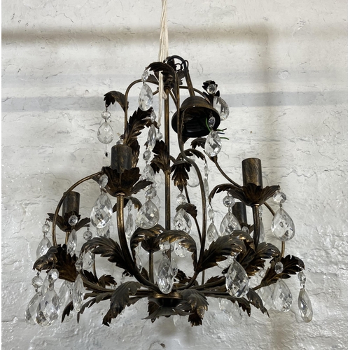 158A - A French style cast metal five branch chandelier