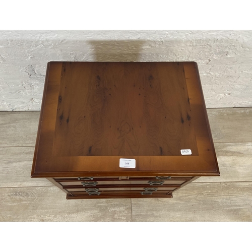 169 - A yew wood miniature chest of drawers - approx. 50.5cm high x 45cm wide x 33.5cm deep