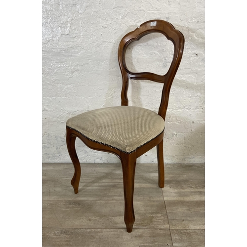 209 - A set of four Victorian style beech balloon back dining chairs