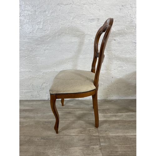 209 - A set of four Victorian style beech balloon back dining chairs