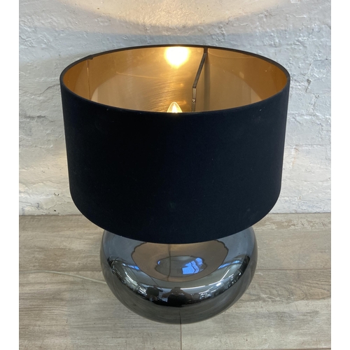 210 - A contemporary grey glass table lamp with black shade