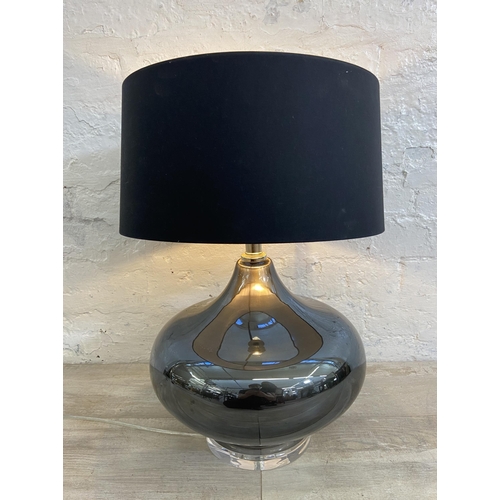 210 - A contemporary grey glass table lamp with black shade