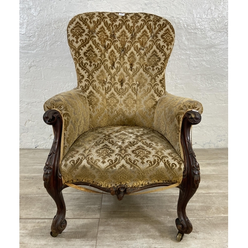 24 - A Victorian mahogany and floral fabric upholstered parlour chair - approx. 105cm high x 77cm wide x ... 