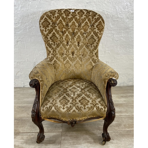 24 - A Victorian mahogany and floral fabric upholstered parlour chair - approx. 105cm high x 77cm wide x ... 